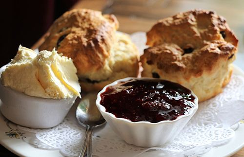 two scones with jam and butter at school tour